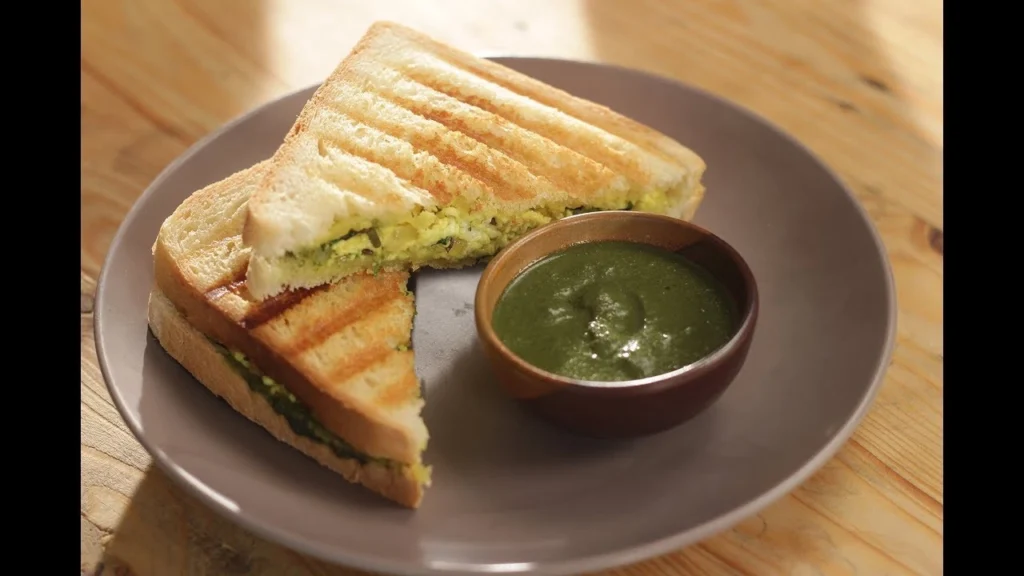 Paneer bhurji sandwich with spiced scrambled paneer on toasted whole wheat bread