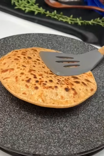 Sattu paratha cooked until golden brown and served as a filling Indian-inspired breakfast