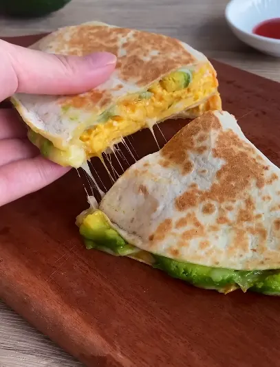 Crispy quesadillas filled with bacon, spinach, tomato, and melted cheese
