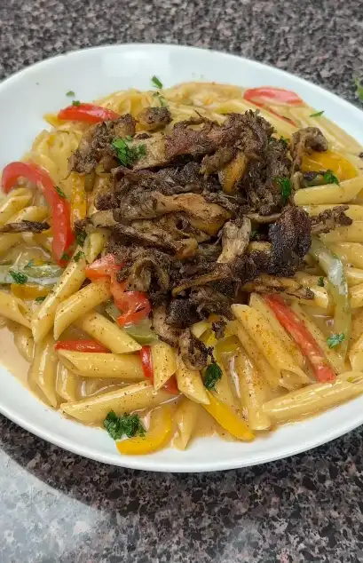 Creamy plant-based rasta pasta with bell peppers and dairy-free sauce