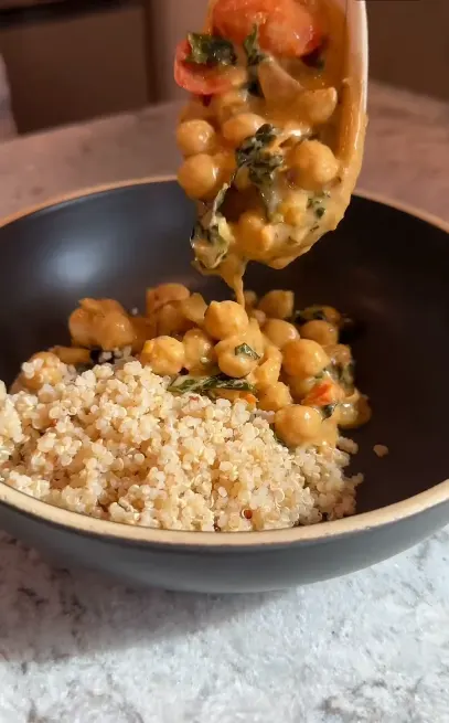 Creamy Tuscan chickpeas with kale, tomatoes, and dairy-free sauce