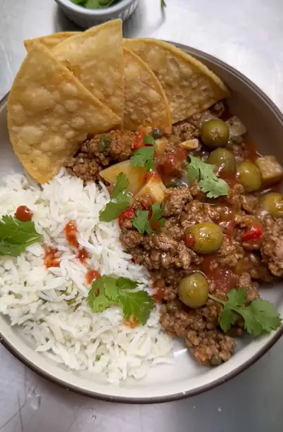 Cuban-style picadillo over rice with cilantro
