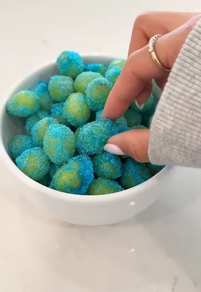 Frozen grapes and mango pieces