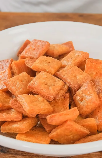 Homemade cheese crackers on a small plate