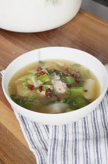 Easy wonton soup with pork meatballs and greens