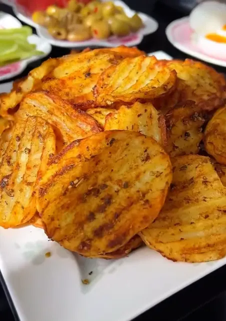 Homemade baked potato chips with sea salt
