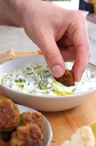 Tzatziki yogurt sauce with cucumber, dill, garlic, lemon, and Greek yogurt.