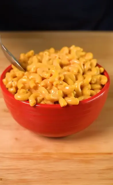 Creamy high-protein vegan mac and cheese made with protein pasta, white beans, cashews, and nutritional yeast