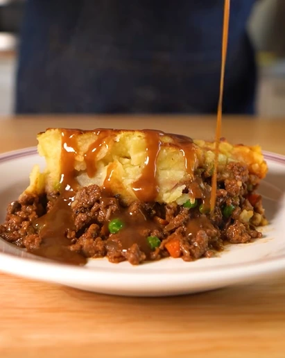 Vegan shepherd’s pie with golden mashed potato topping and lentil mushroom filling